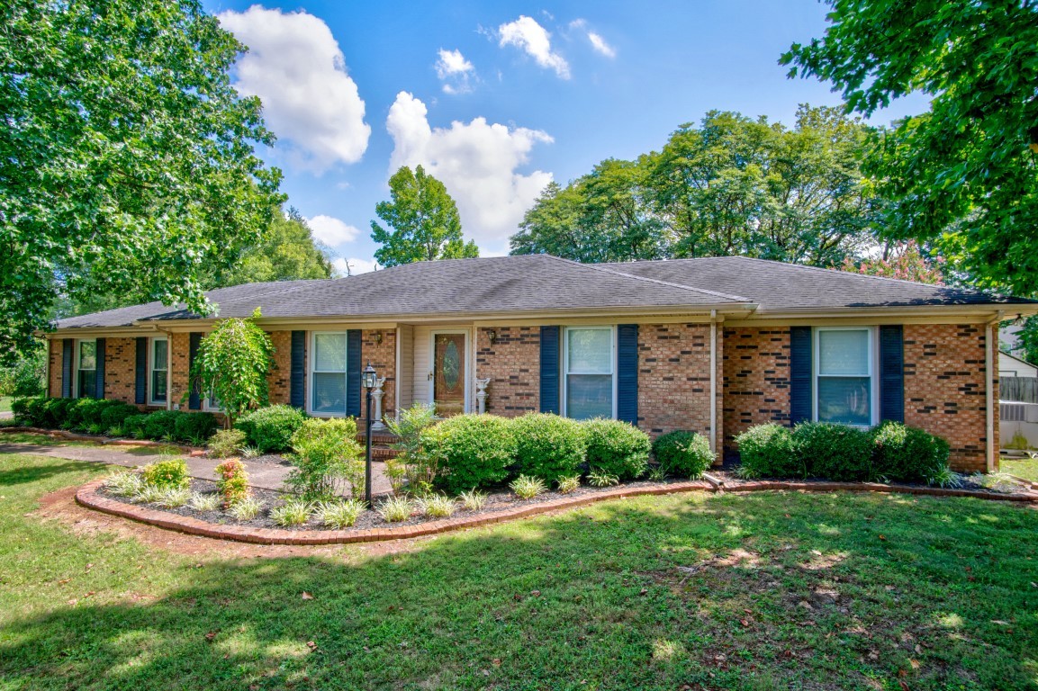 2407 Braxton Bragg Drive Murfreesboro, TN 37129 - Photo 1 of 23 a front view of a house with a yard table and chairs