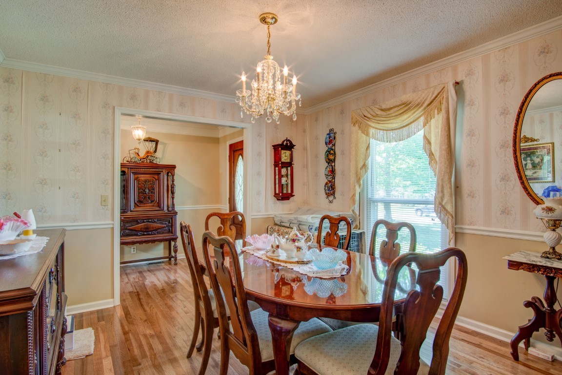 2407 Braxton Bragg Drive Murfreesboro, TN 37129 - Photo 11 of 23 a view of a dining room with furniture and windows