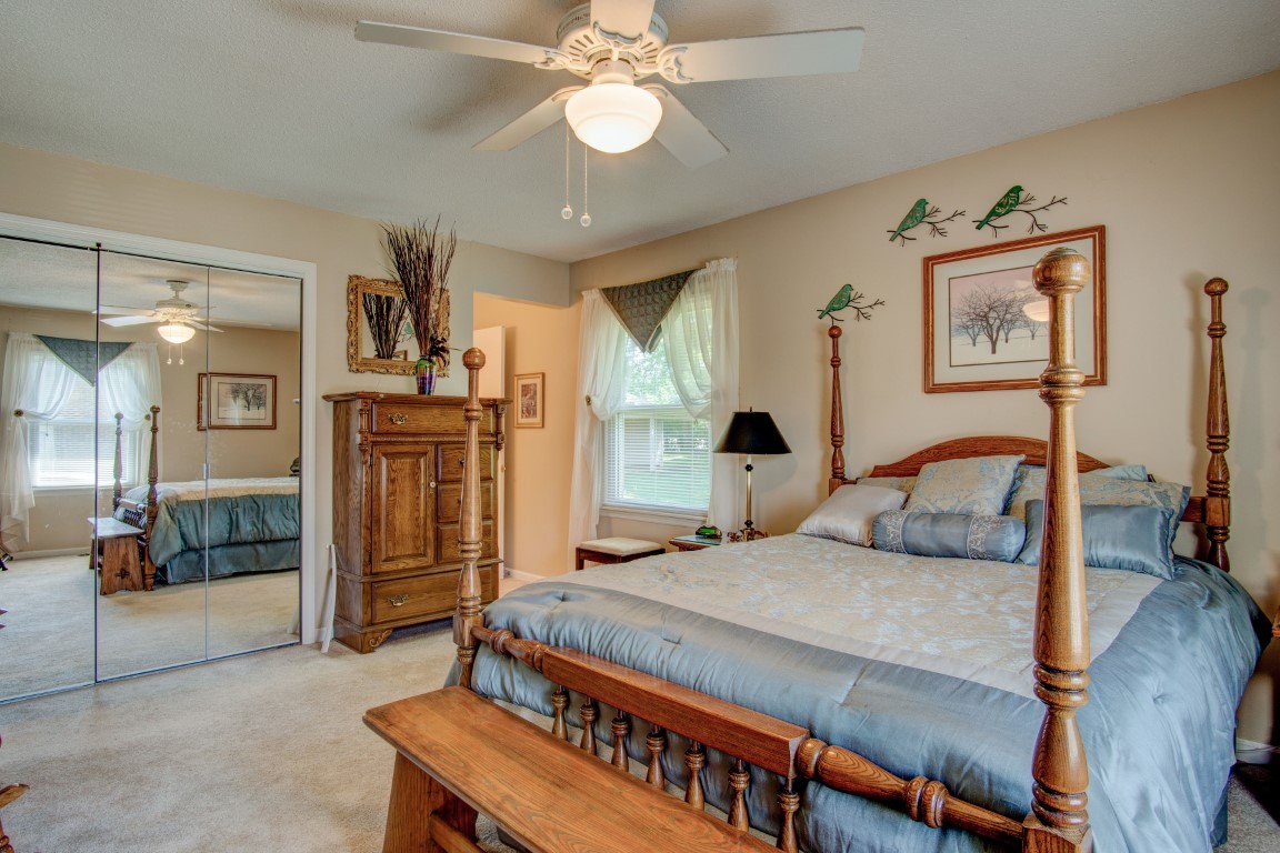 2407 Braxton Bragg Drive Murfreesboro, TN 37129 - Photo 16 of 23 a bedroom with a bed and a chandelier