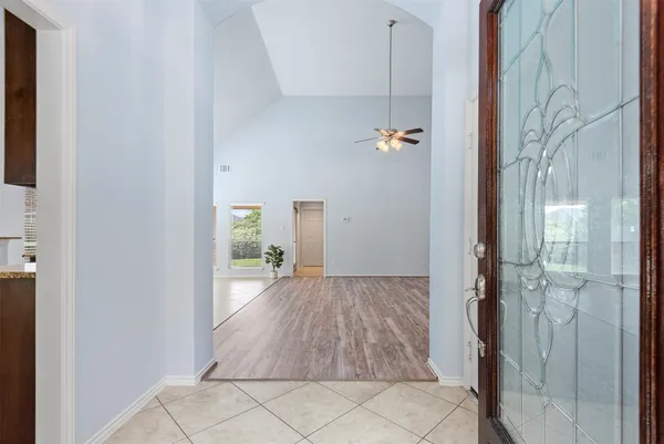 a view of a bathroom from a hallway