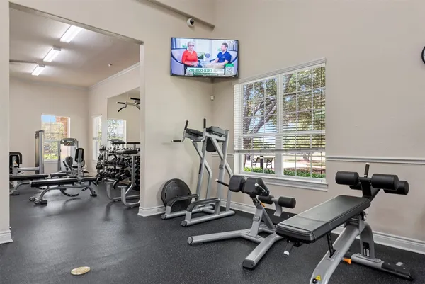 a view of a room with gym equipment