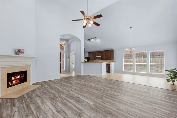 an aerial view of residential houses with outdoor space and river