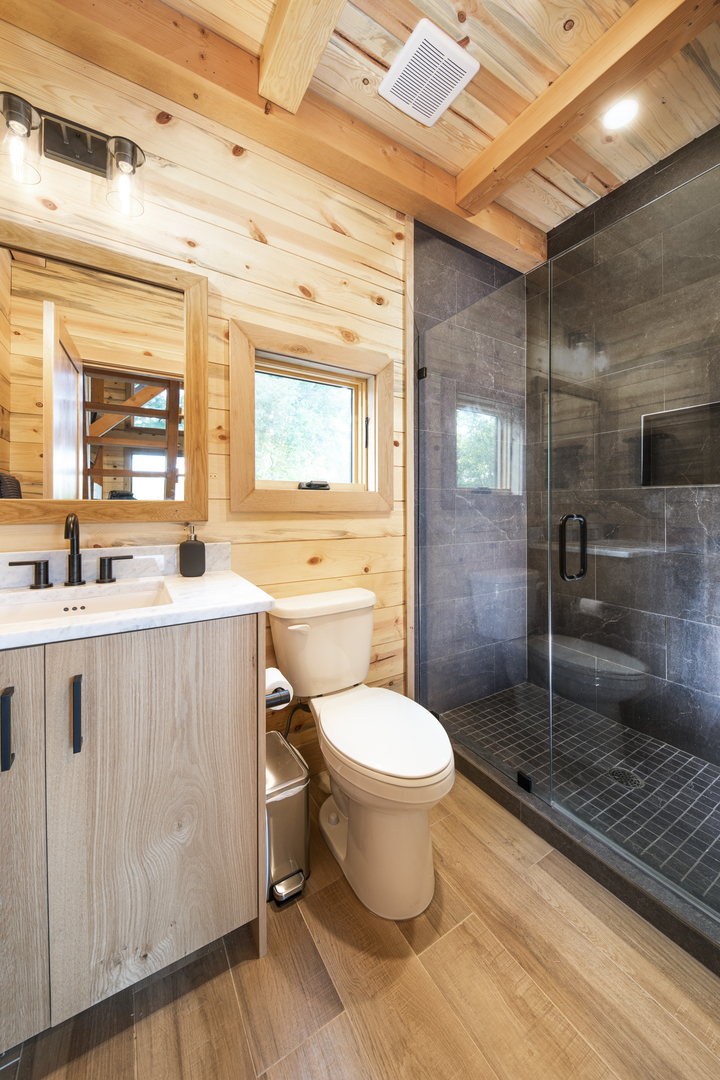 1667 Sherwood Camp Road Dahinda, IL 61428 - Photo 20 of 26 a bathroom with a sink toilet and shower