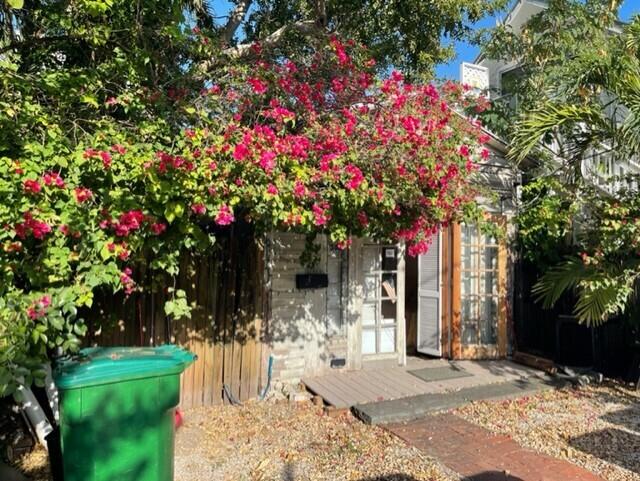 301 Elizabeth Street Key West, FL 33040 - Photo 3 of 6 a front view of a house with fountain