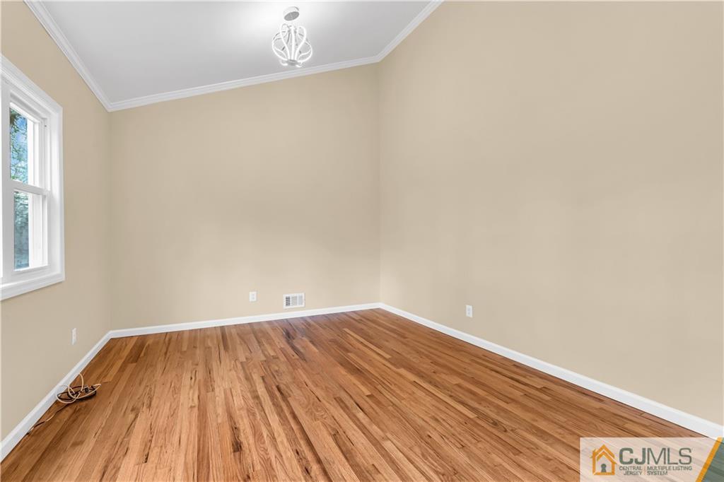 9 Nancy Circle Edison, NJ 08817 - Photo 16 of 38 wooden floor in a room