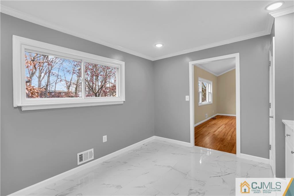 9 Nancy Circle Edison, NJ 08817 - Photo 23 of 38 a view of an empty room and window