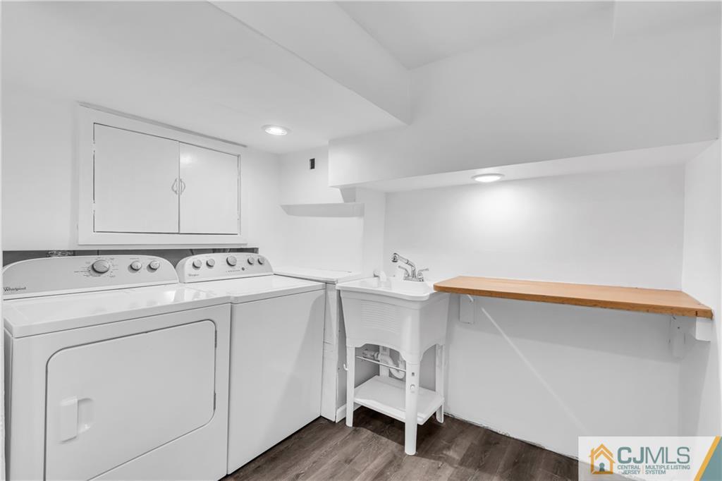 9 Nancy Circle Edison, NJ 08817 - Photo 34 of 38 a view of a storage & utility room with washer and dryer