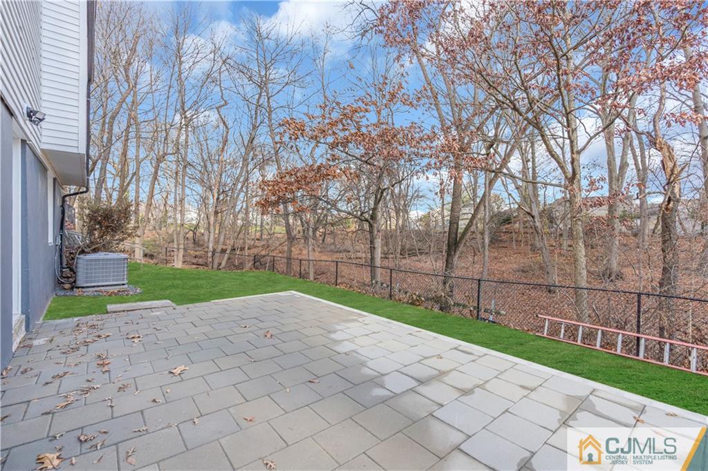 9 Nancy Circle Edison, NJ 08817 - Photo 37 of 38 a view of road with a small yard