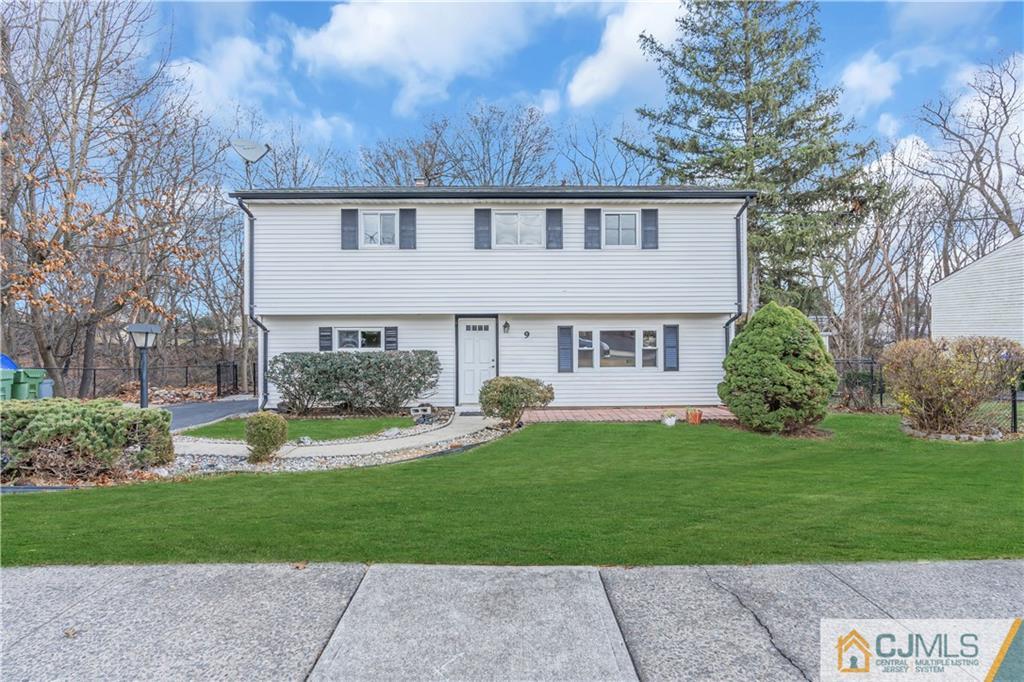 9 Nancy Circle Edison, NJ 08817 - Photo 4 of 38 front view of a house with a yard