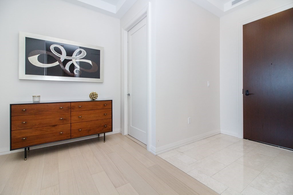 1 Franklin Street, Unit 5205 Boston, MA 02110 - Photo 21 of 40 a area with painting on the wall