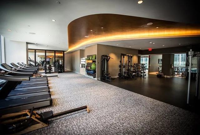 a lobby with a projector and living room