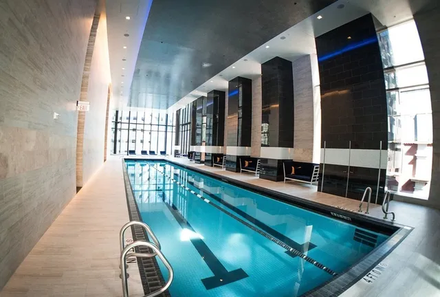 a view of an empty room with windows