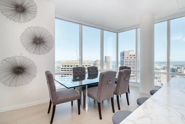 a view of a livingroom with furniture and window