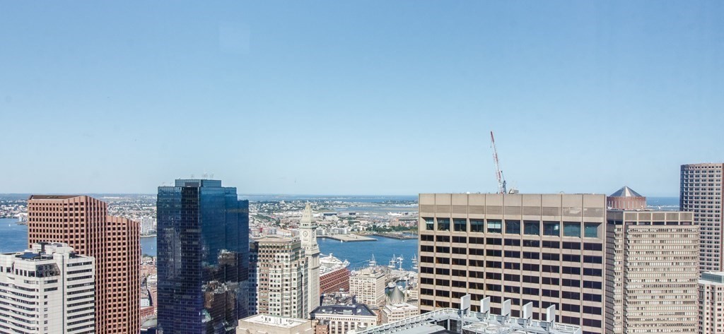 1 Franklin Street, Unit 5205 Boston, MA 02110 - Photo 8 of 40 a front view of a building with glass windows