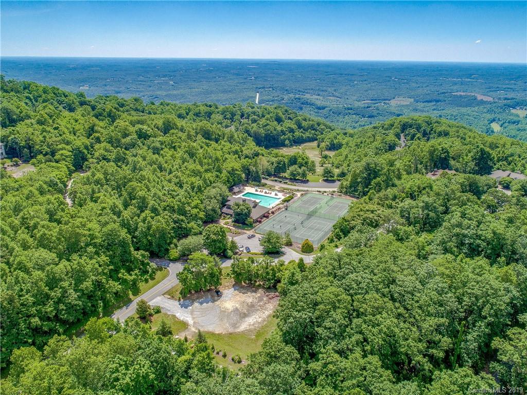 136 High Rock Ridge Drive Landrum, SC 29356 - Photo 4 of 44 an aerial view of a house with a yard