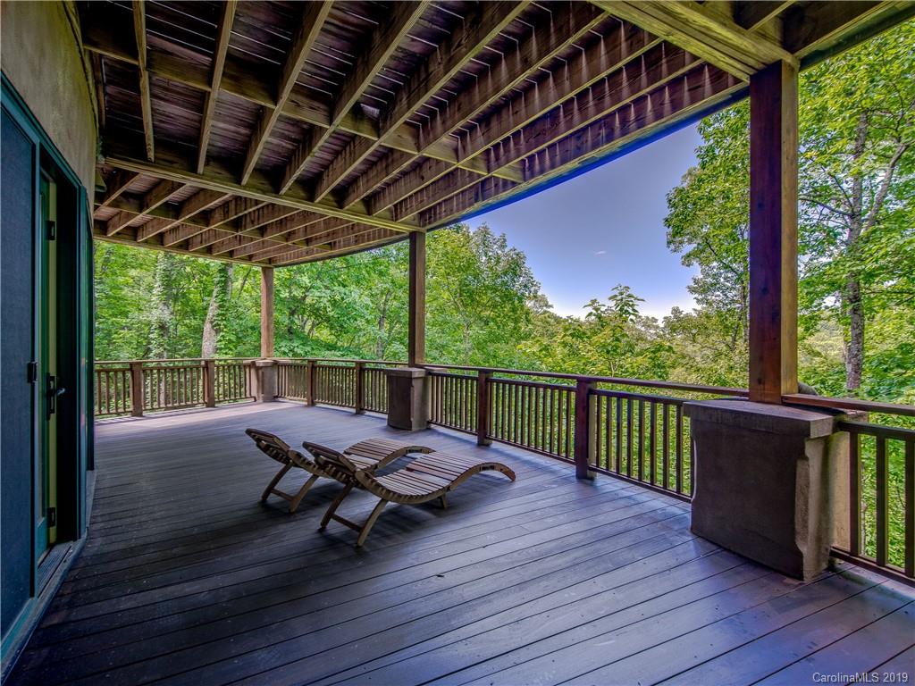 136 High Rock Ridge Drive Landrum, SC 29356 - Photo 38 of 44 a view of a outdoor space with wooden floor and outdoor seating