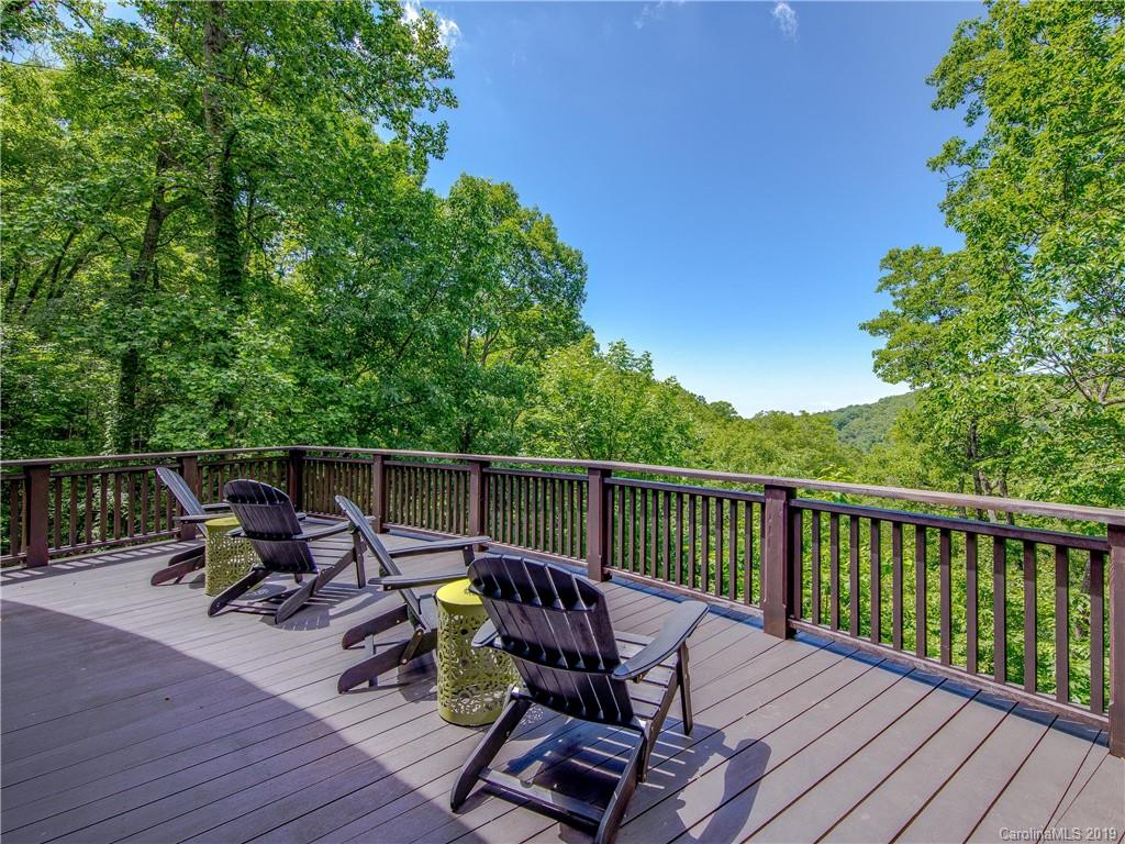 136 High Rock Ridge Drive Landrum, SC 29356 - Photo 42 of 44 a view of balcony with furniture and hardwood