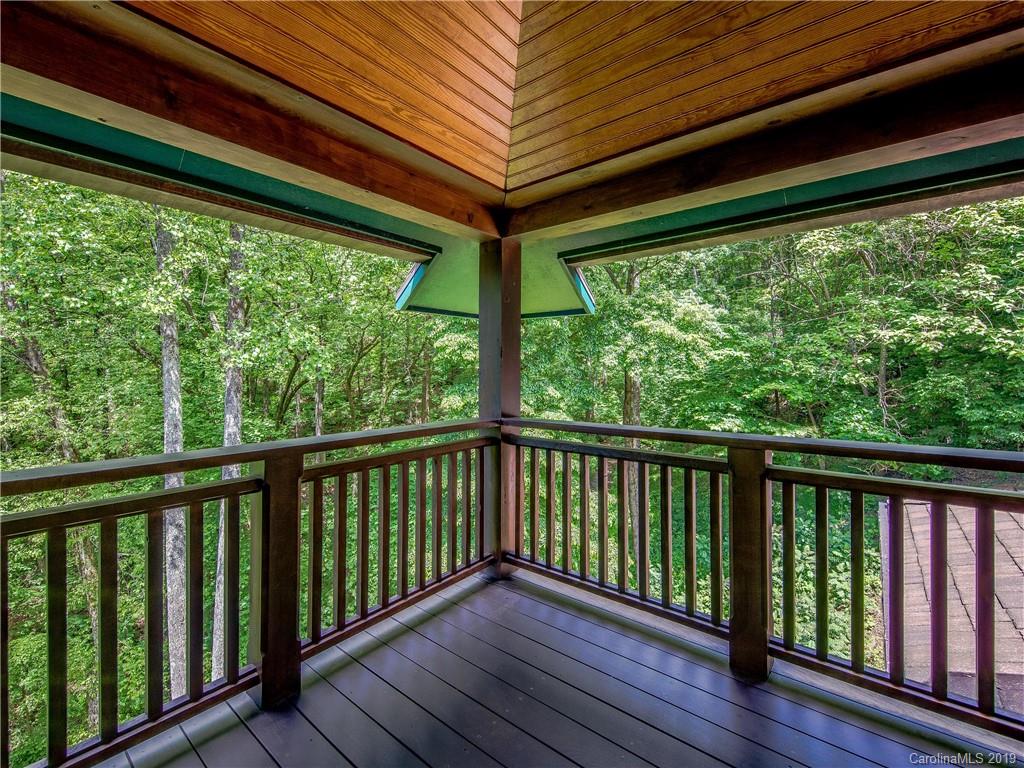 136 High Rock Ridge Drive Landrum, SC 29356 - Photo 43 of 44 a view of a balcony with wooden floor