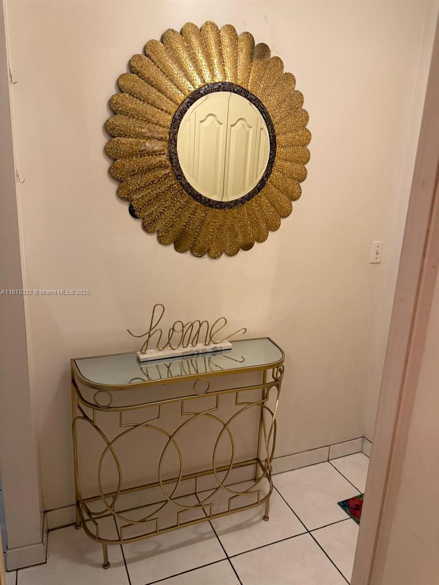 1710 Northeast 191st Street, Unit 3173 Miami, FL 33179 - Photo 12 of 18 a close view of dining table