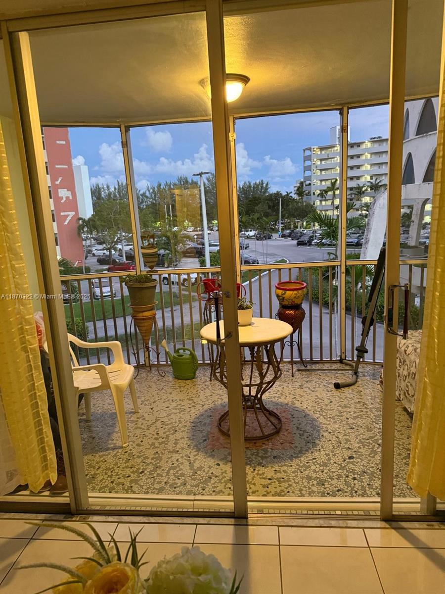 1710 Northeast 191st Street, Unit 3173 Miami, FL 33179 - Photo 7 of 18 a view of swimming pool with a lounge chairs