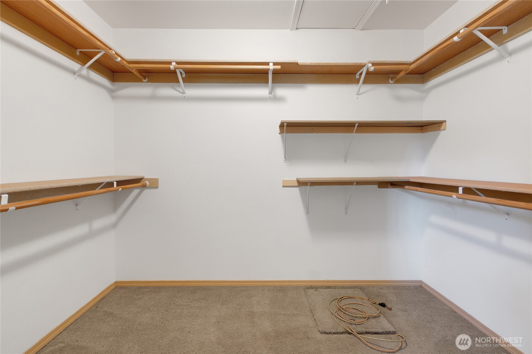 1450 Southeast Spruce Road Port Orchard, WA 98367 - Photo 20 of 39 a view of a room with racks on the wall