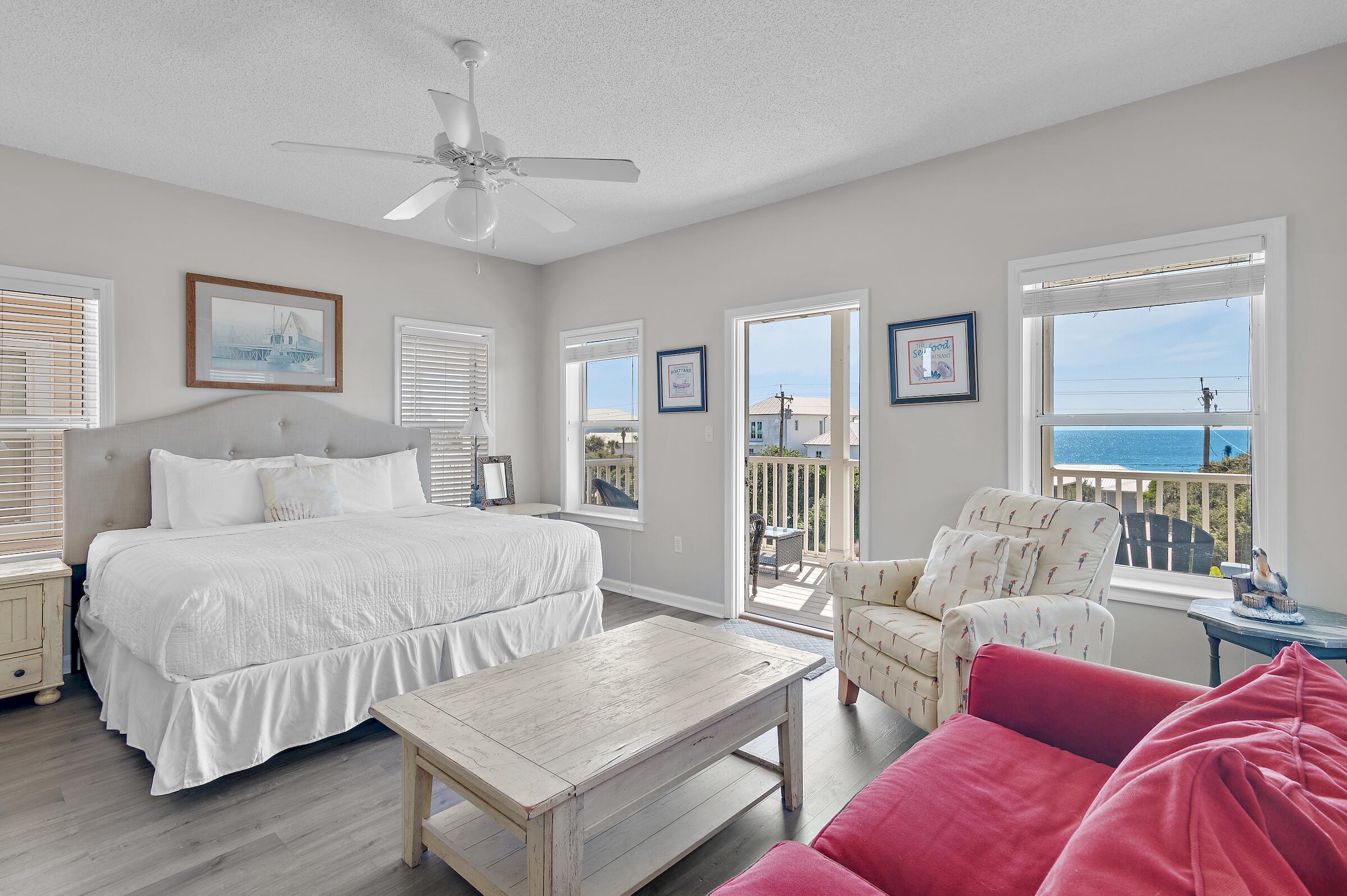 69 Seabreeze Trail Inlet Beach, FL 32461 - Photo 27 of 40 a bedroom with furniture and wooden floor