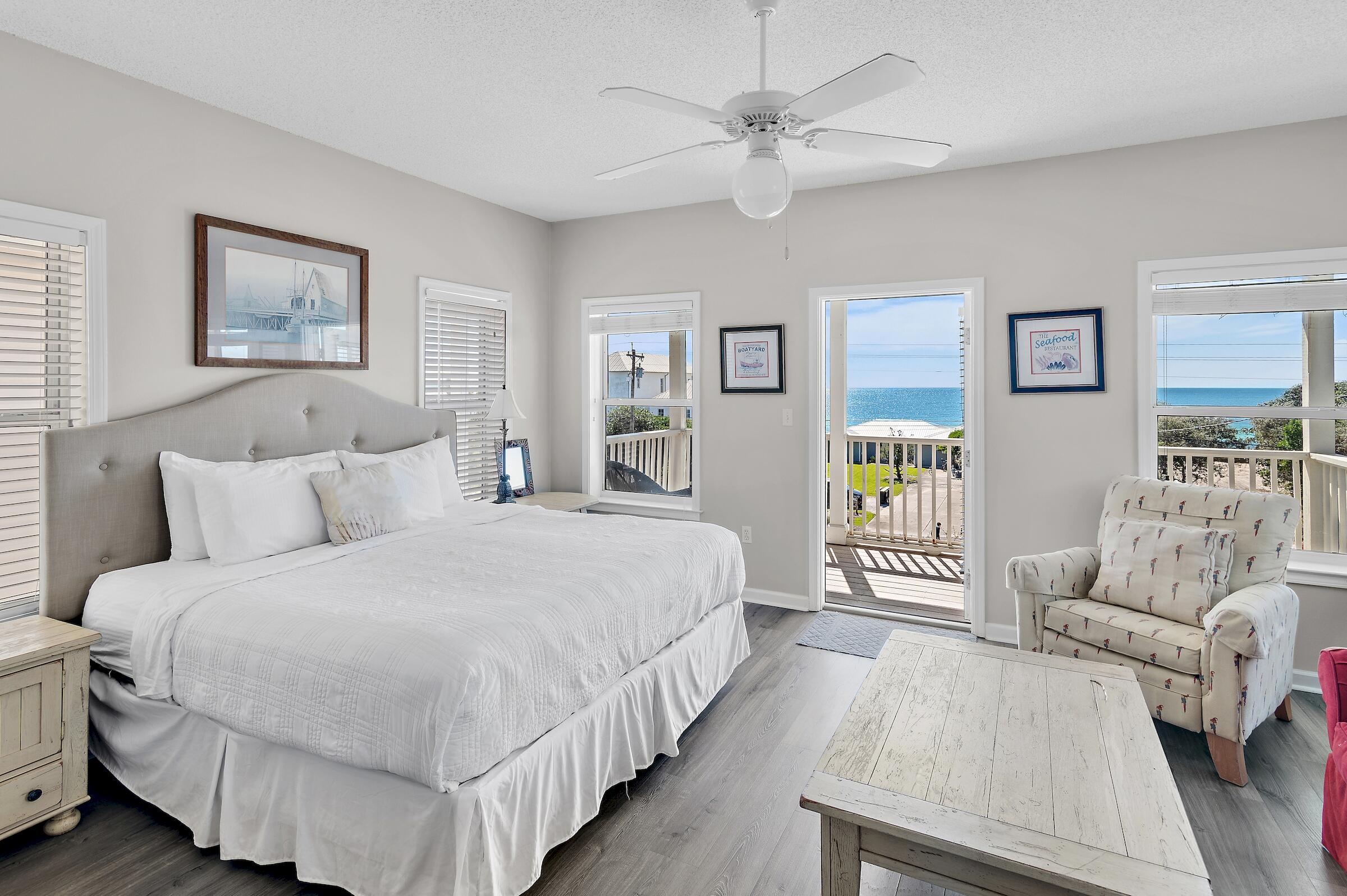 69 Seabreeze Trail Inlet Beach, FL 32461 - Photo 28 of 40 a bedroom with a large bed and a couch
