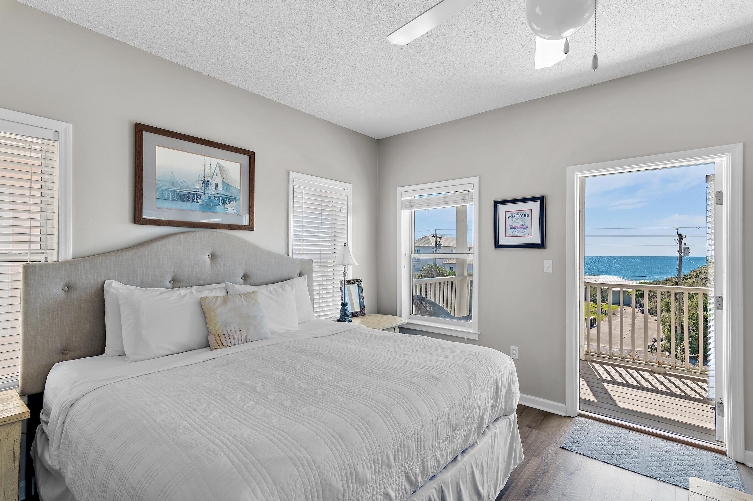 69 Seabreeze Trail Inlet Beach, FL 32461 - Photo 28 of 40 a bedroom with a large bed and a window