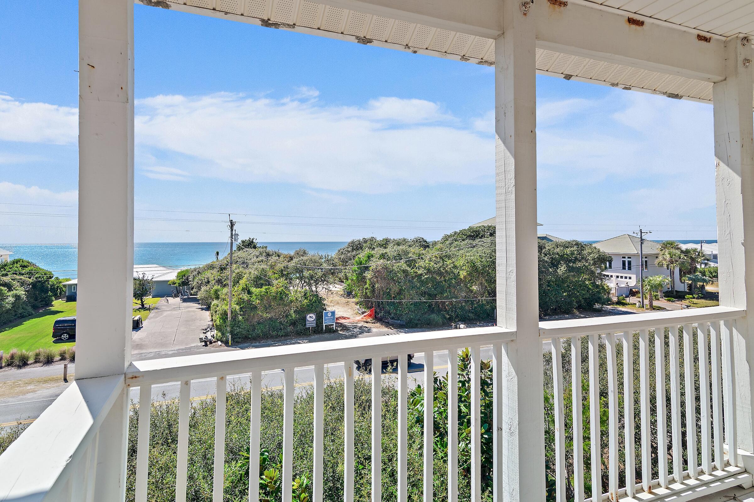 69 Seabreeze Trail Inlet Beach, FL 32461 - Photo 31 of 40 a view of a balcony with wooden floor