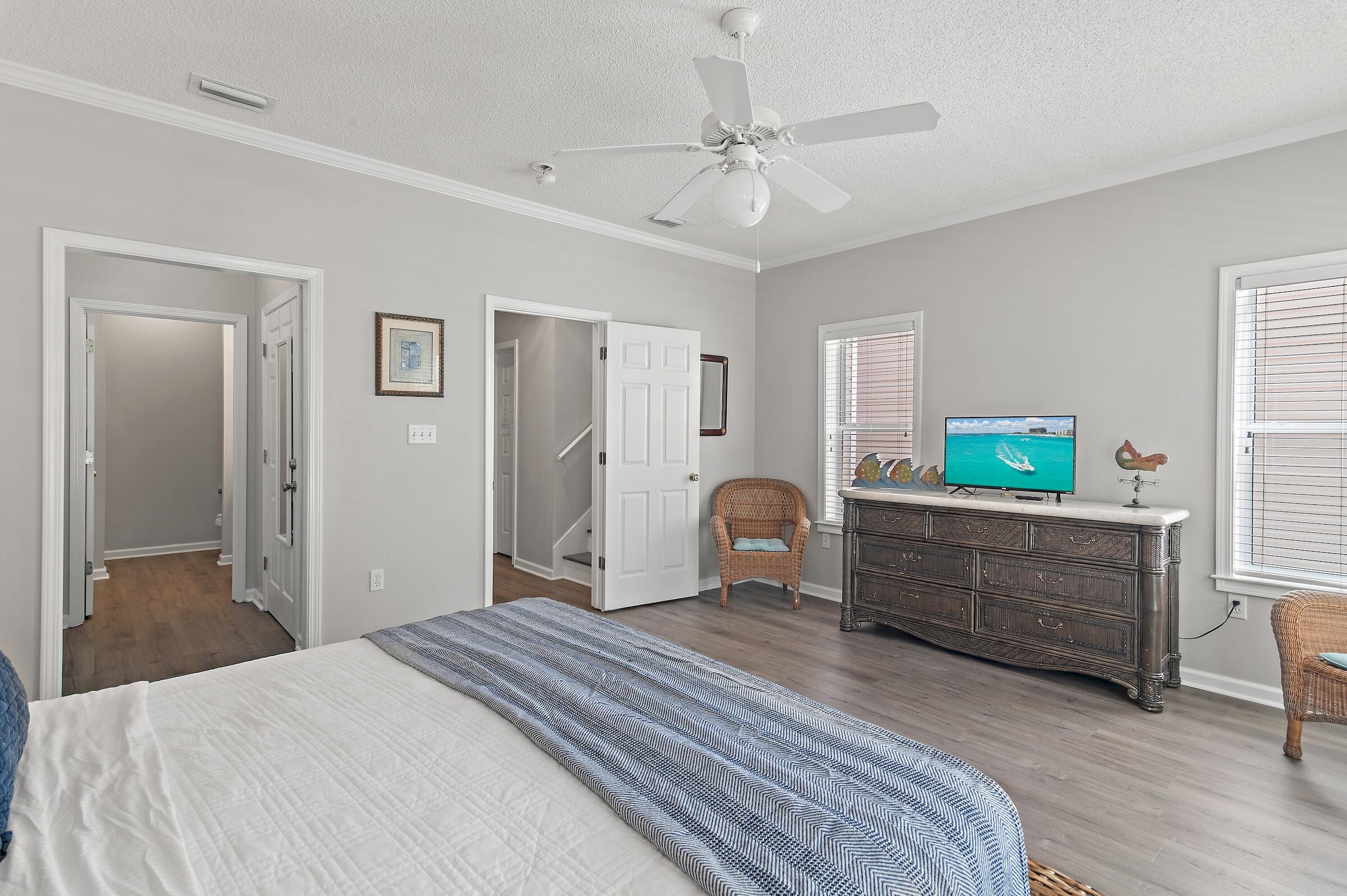 69 Seabreeze Trail Inlet Beach, FL 32461 - Photo 6 of 40 a bedroom with a bed and a dresser