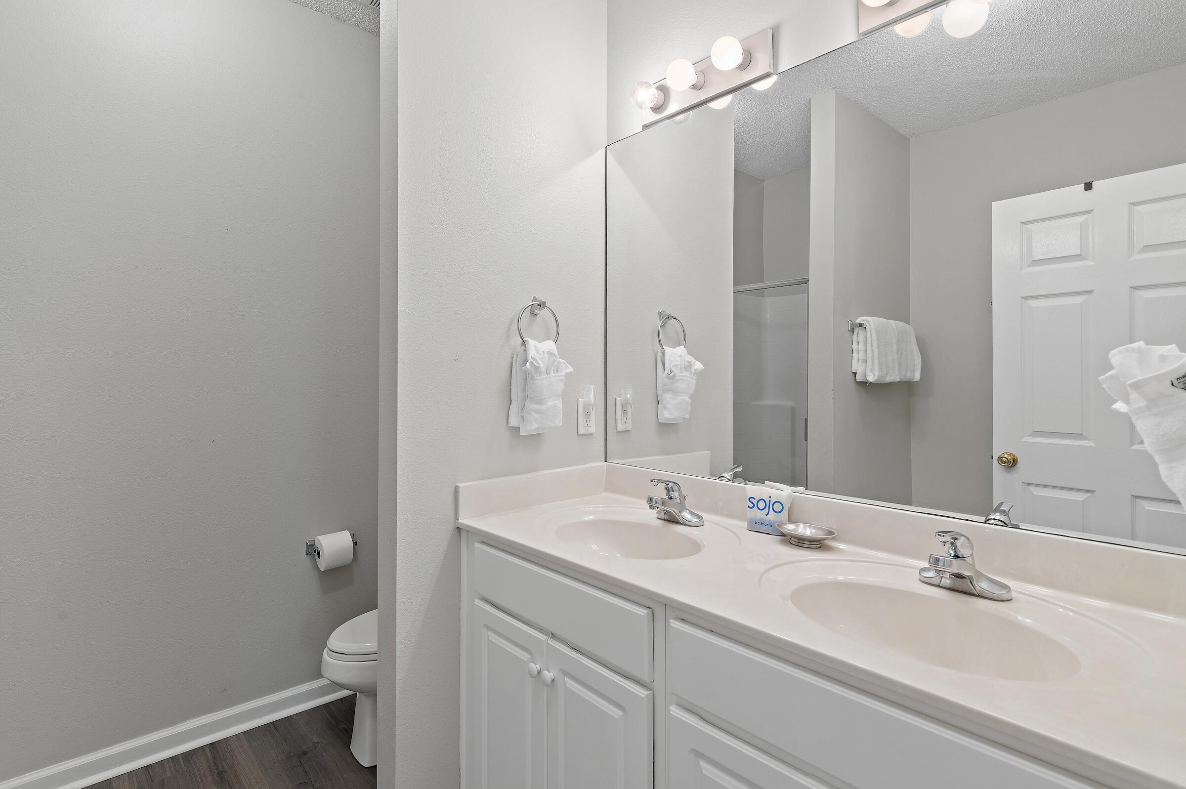 69 Seabreeze Trail Inlet Beach, FL 32461 - Photo 8 of 40 a bathroom with a sink a toilet and shower