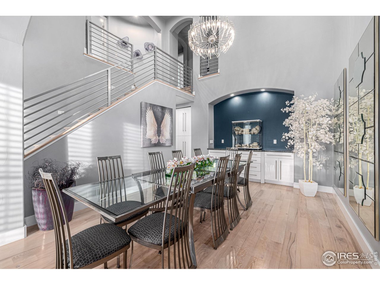 285 Commander Drive Erie, CO 80516 - Photo 19 of 40 a view of a dining room with furniture and wooden floor