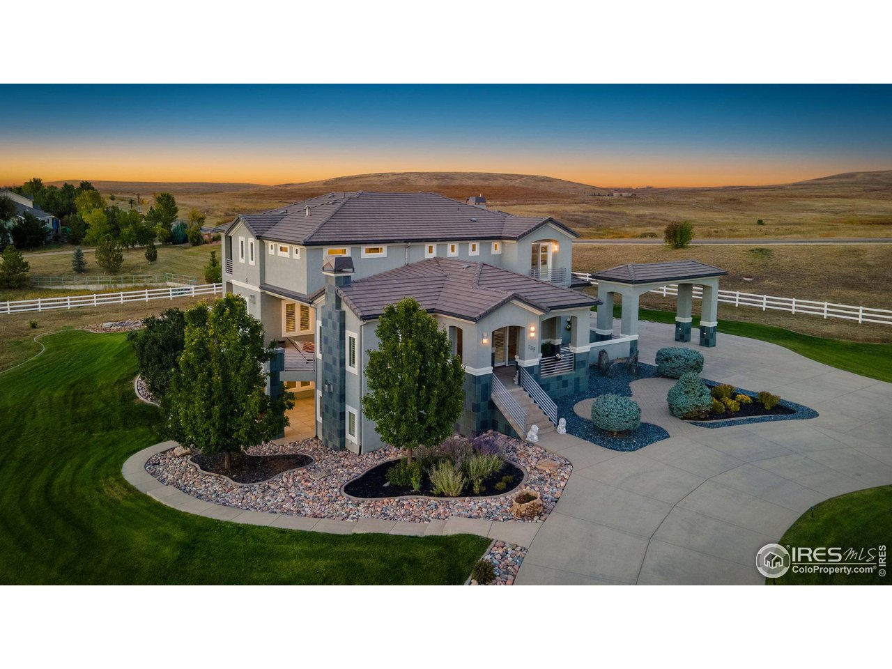 285 Commander Drive Erie, CO 80516 - Photo 2 of 40 a view of a terrace with chairs