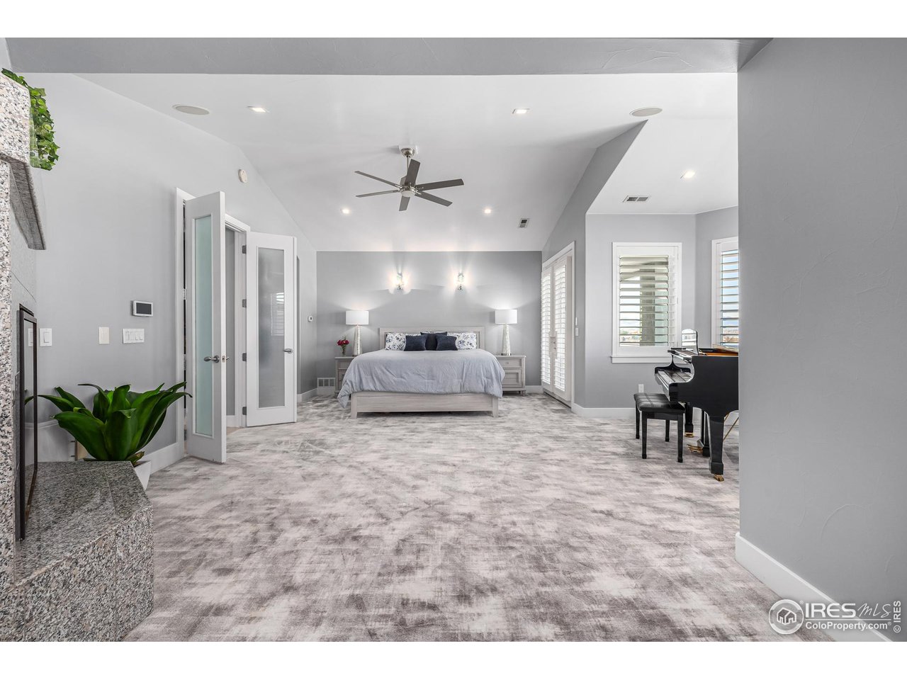 285 Commander Drive Erie, CO 80516 - Photo 23 of 40 a living room with furniture and a dining table