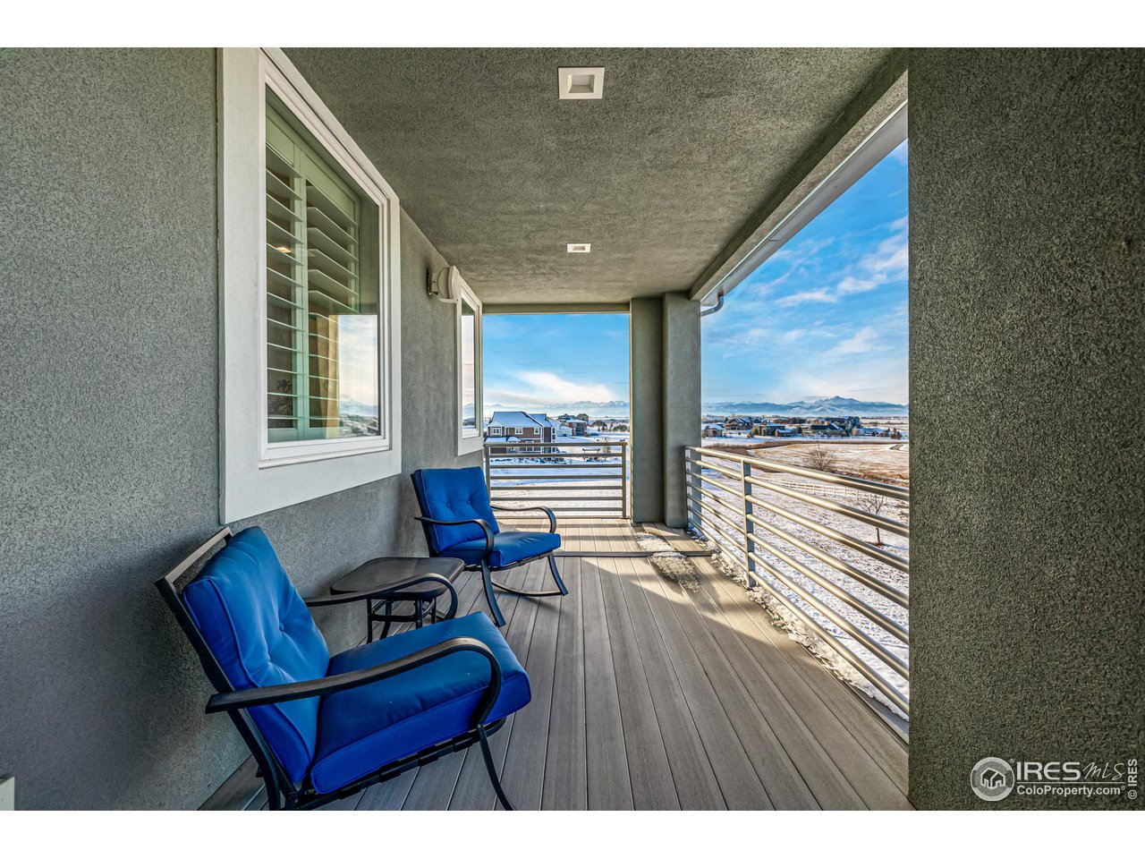285 Commander Drive Erie, CO 80516 - Photo 36 of 40 a living room with furniture and a large window