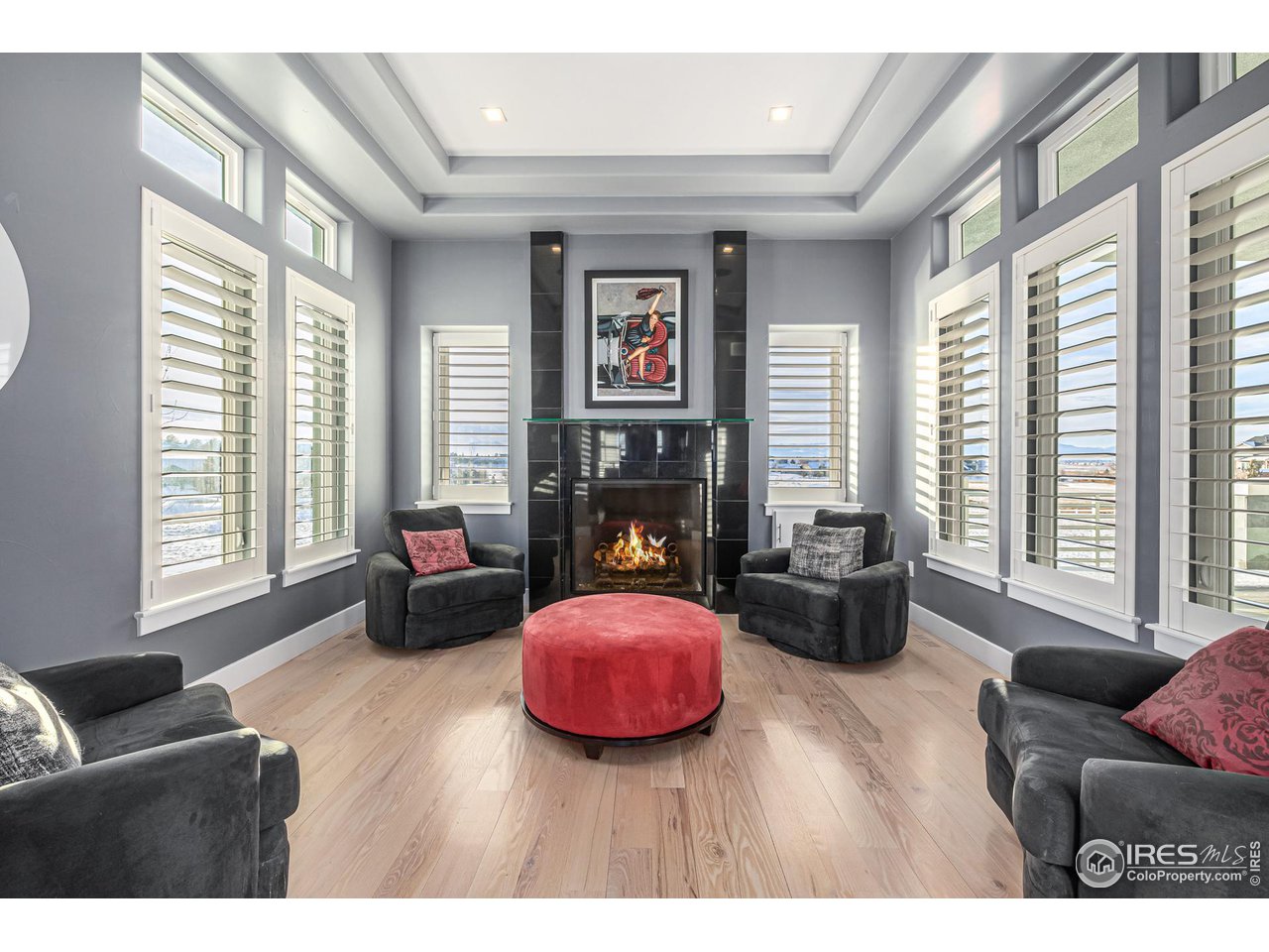285 Commander Drive Erie, CO 80516 - Photo 10 of 40 a living room with furniture fireplace and flat screen tv
