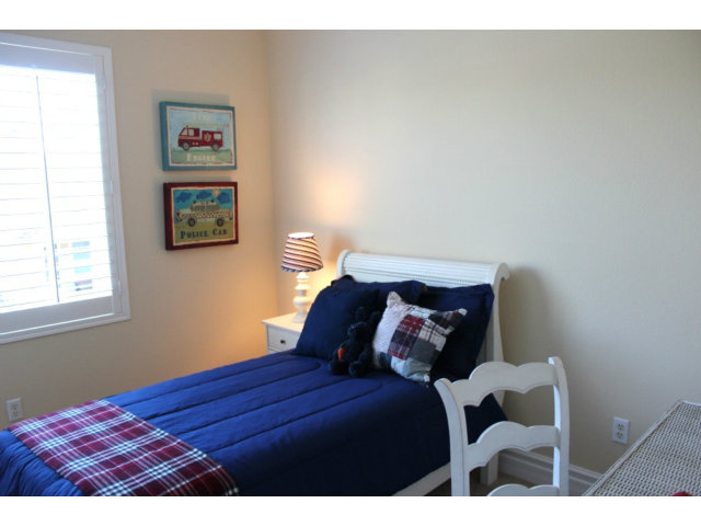 76 Images Circle Milpitas, CA 95035 - Photo 16 of 18 a bedroom with a bed and a window