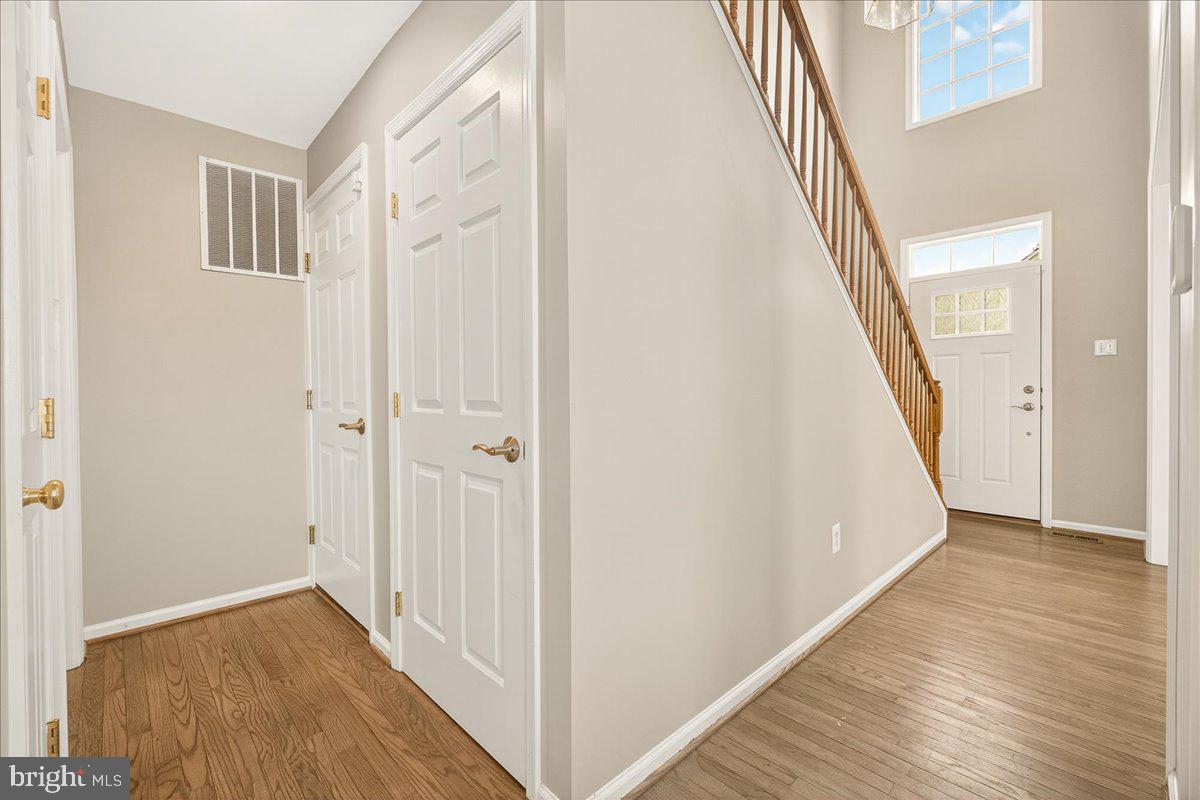 1308 Crossbow Road Mount Airy, MD 21771 - Photo 11 of 55 a view of an entryway with wooden floor