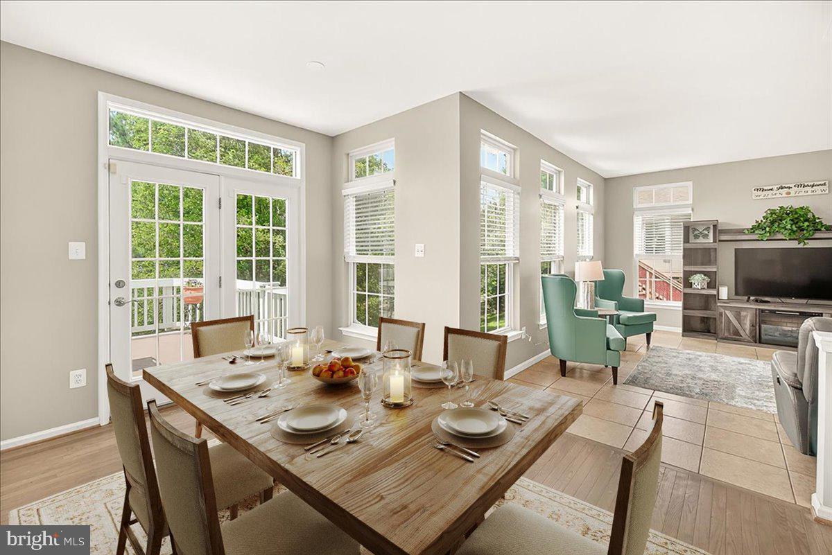 1308 Crossbow Road Mount Airy, MD 21771 - Photo 19 of 55 a view of a dining room with furniture window and outside view