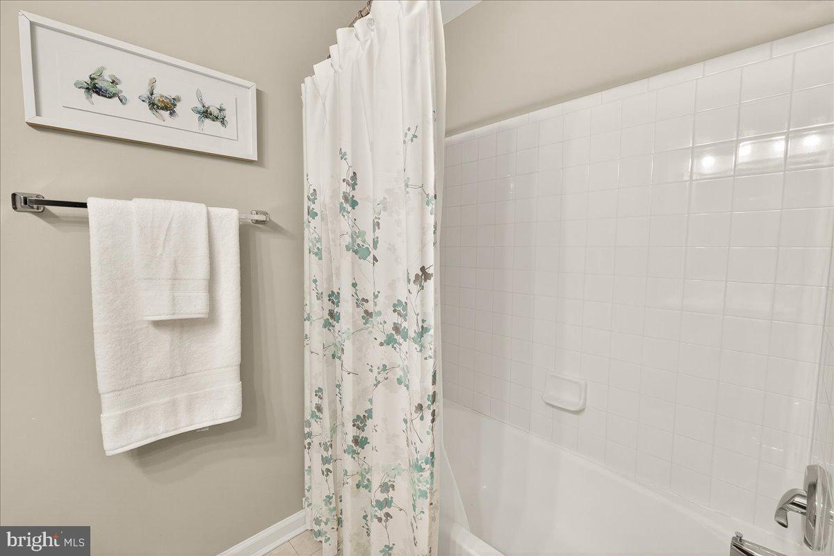 1308 Crossbow Road Mount Airy, MD 21771 - Photo 30 of 55 a bathroom with a bathtub and shower