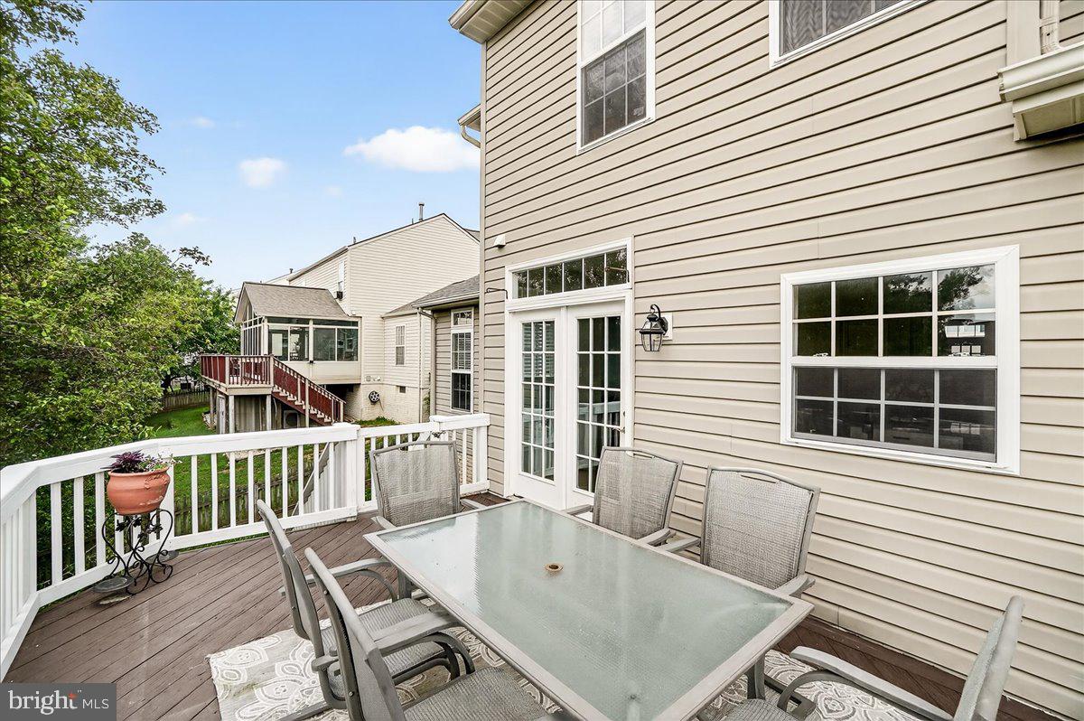 1308 Crossbow Road Mount Airy, MD 21771 - Photo 44 of 55 a view of a house with a chairs in a balcony