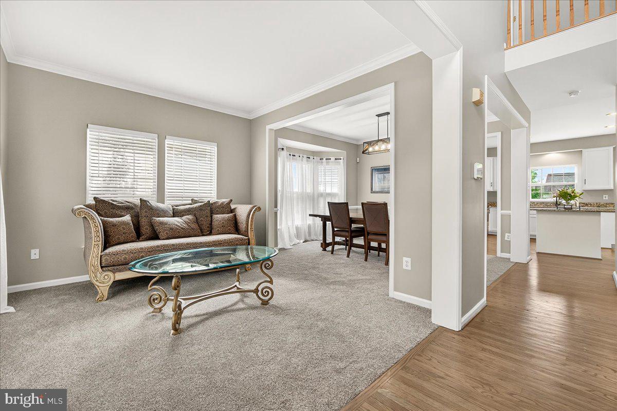 1308 Crossbow Road Mount Airy, MD 21771 - Photo 6 of 55 a living room with furniture and a table