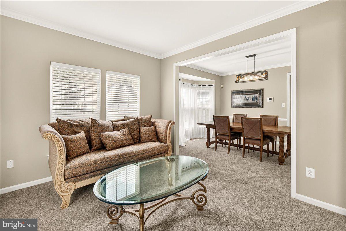 1308 Crossbow Road Mount Airy, MD 21771 - Photo 7 of 55 a living room with furniture and a large window