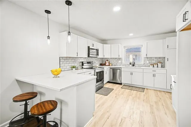 $358,000 | 619 East 109th Terrace, Kansas City, MO 64131