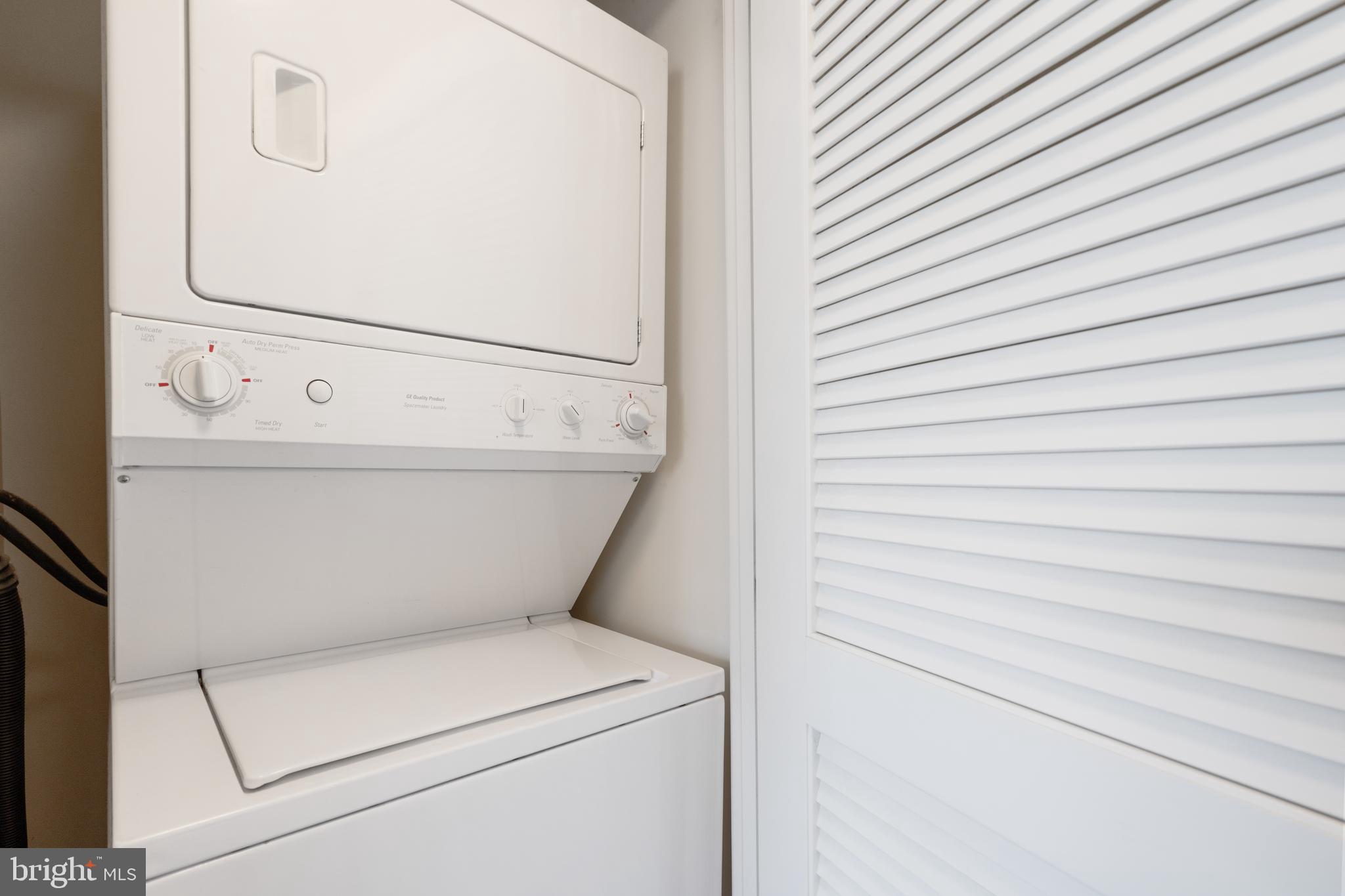 11760 Sunrise Valley Drive, Unit 209 Reston, VA 20191 - Photo 14 of 23 a close up view of washer and dryer