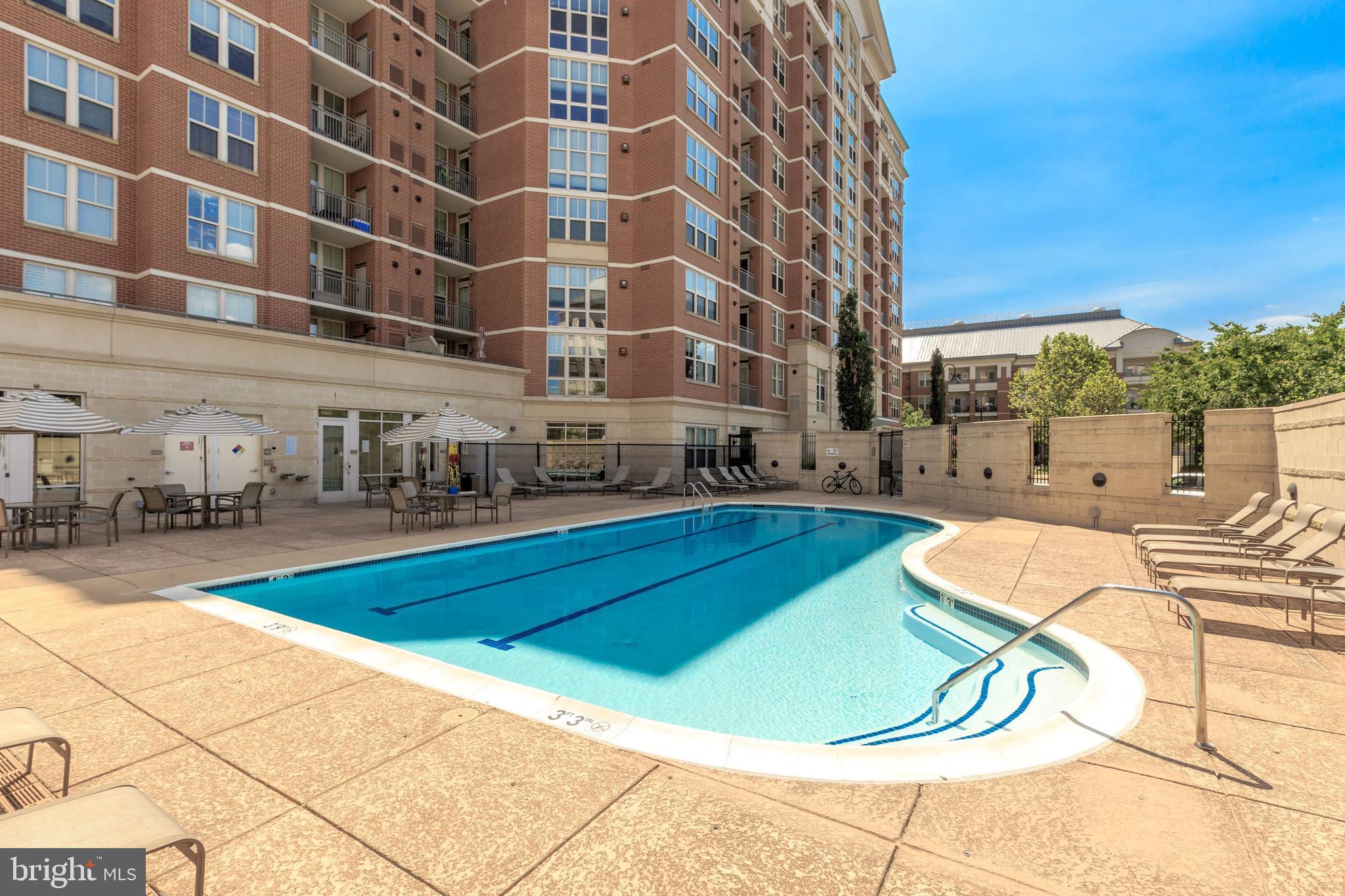11760 Sunrise Valley Drive, Unit 209 Reston, VA 20191 - Photo 19 of 23 a view of a swimming pool