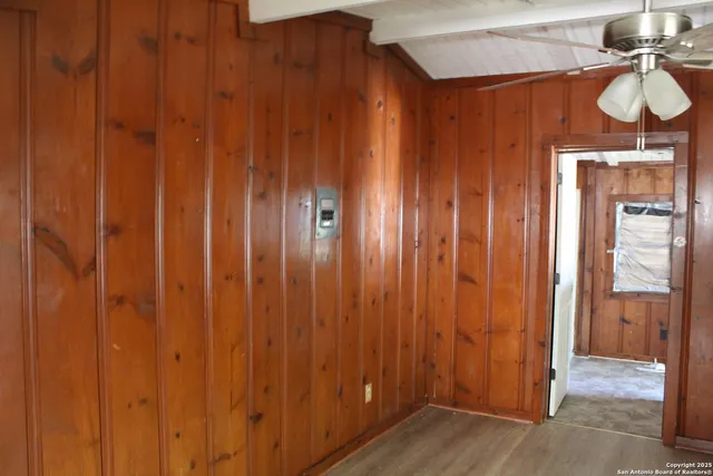 a bathroom with a mirror and a shower curtain