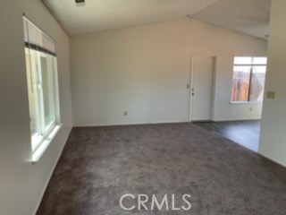 22276 Minnetonka Road Apple Valley, CA 92308 - Photo 4 of 11 a view of an empty room and window