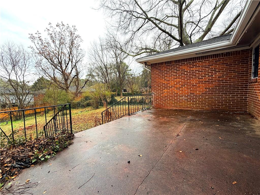2397 Tilson Road Decatur, GA 30032 - Photo 16 of 22 a view of backyard and trees