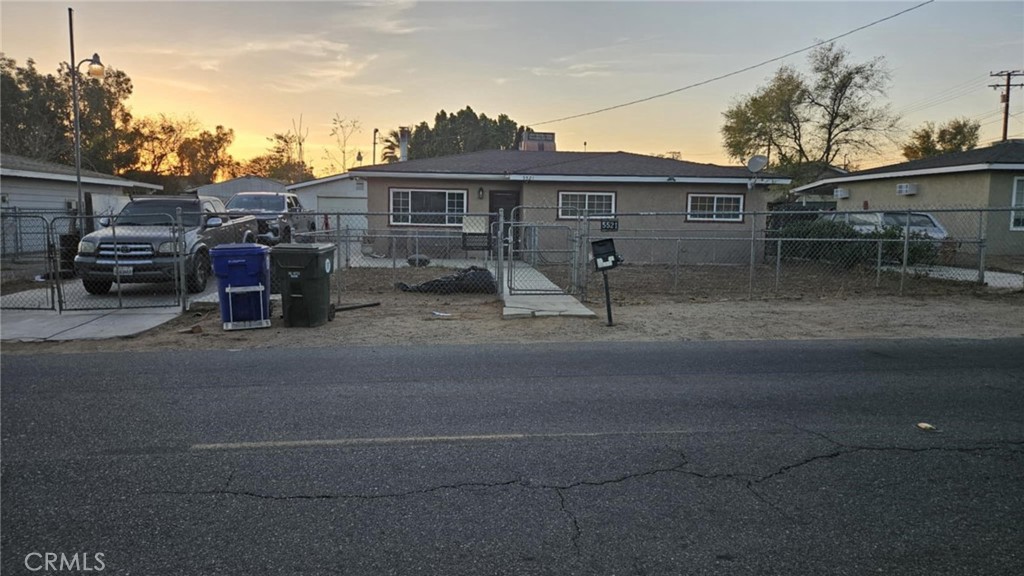 a view of a car park in front of house